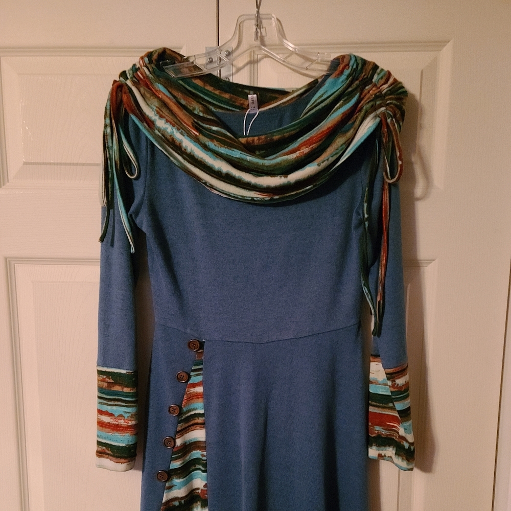 Knee length dress perfect for fall and winter. New without tags. Never worn.
